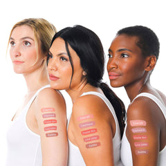lique matte liquid lip arm swatches on three women